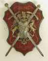 Wall Panoply with medieval swords and lion unicorn crest